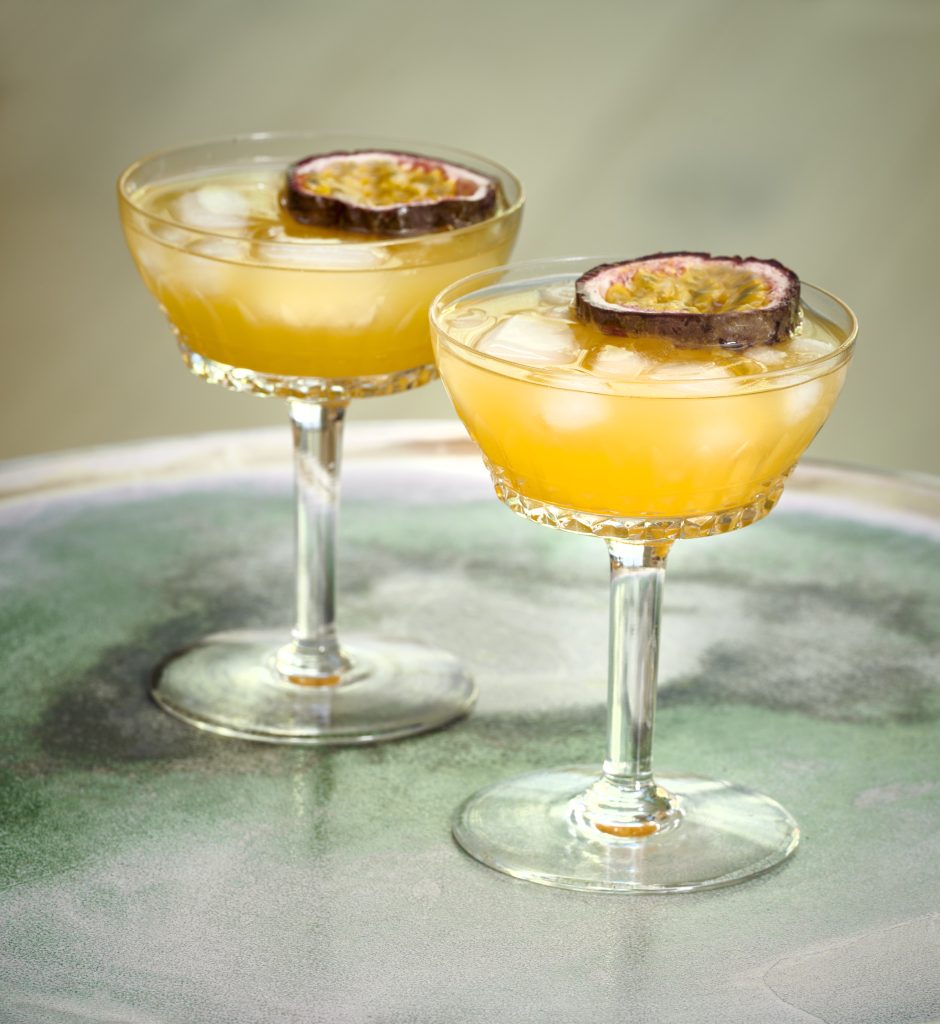 elegant passion fruit cocktail photo shoot
